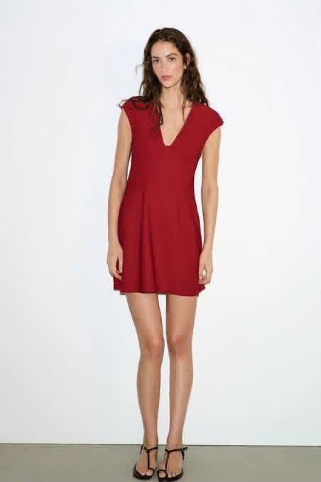 Red V-Neck Cap Sleeve Mini Dress (Category: Dresses) located in Pasacao. Submitted by eommacollections_ (Listing ID 1462537742, Image 2). Description: - Cute red mini dress - V-neckline with cap sleeves - Flattering fit and flare silhouette - Perfect for parties or a night out - Versatile: easy to dress up or down.