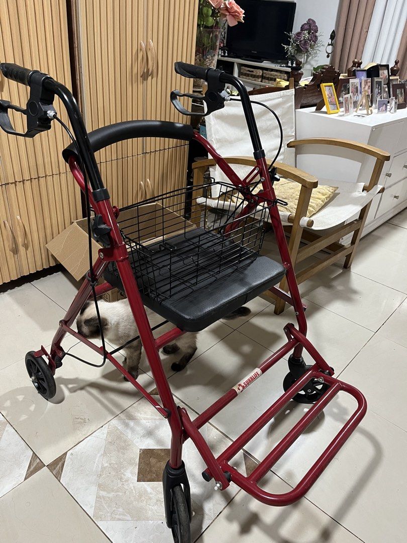 Walker wheels (Category: Wheelchairs) located in Malabon City. Submitted by jacquardsilkph (Listing ID 1462663667, Image 2). Description: - Red walker with built-in seat and basket - Easy to fold for convenient transport - Equipped with brakes on the handles for safety - Provides excellent mobility assistance - Seat offers a place to rest - Basket is ideal for carrying personal items - Ready for a new owner.