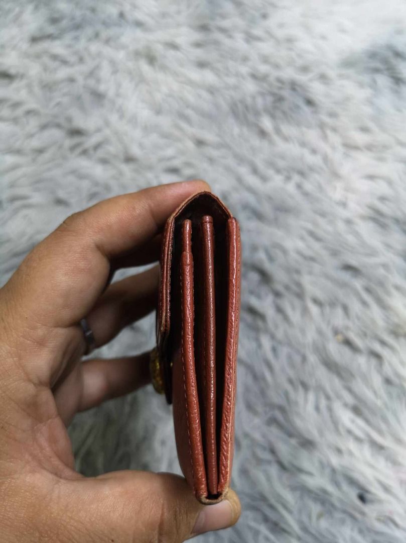 Reddish Brown Fold over Leather Coin Purse (Category: Wallets & Card holders) located in Santa Cruz. Submitted by jmy_surplus.2 (Listing ID 1462674787, Image 2). Description: Size ; L- 4 W - 4 Color ; Reddish brown Type ; Purse Brand ; No brand Material ; Leather Style ; Leather Snap Closure Coin Purse LR 129 JMY 4 Batch #223.