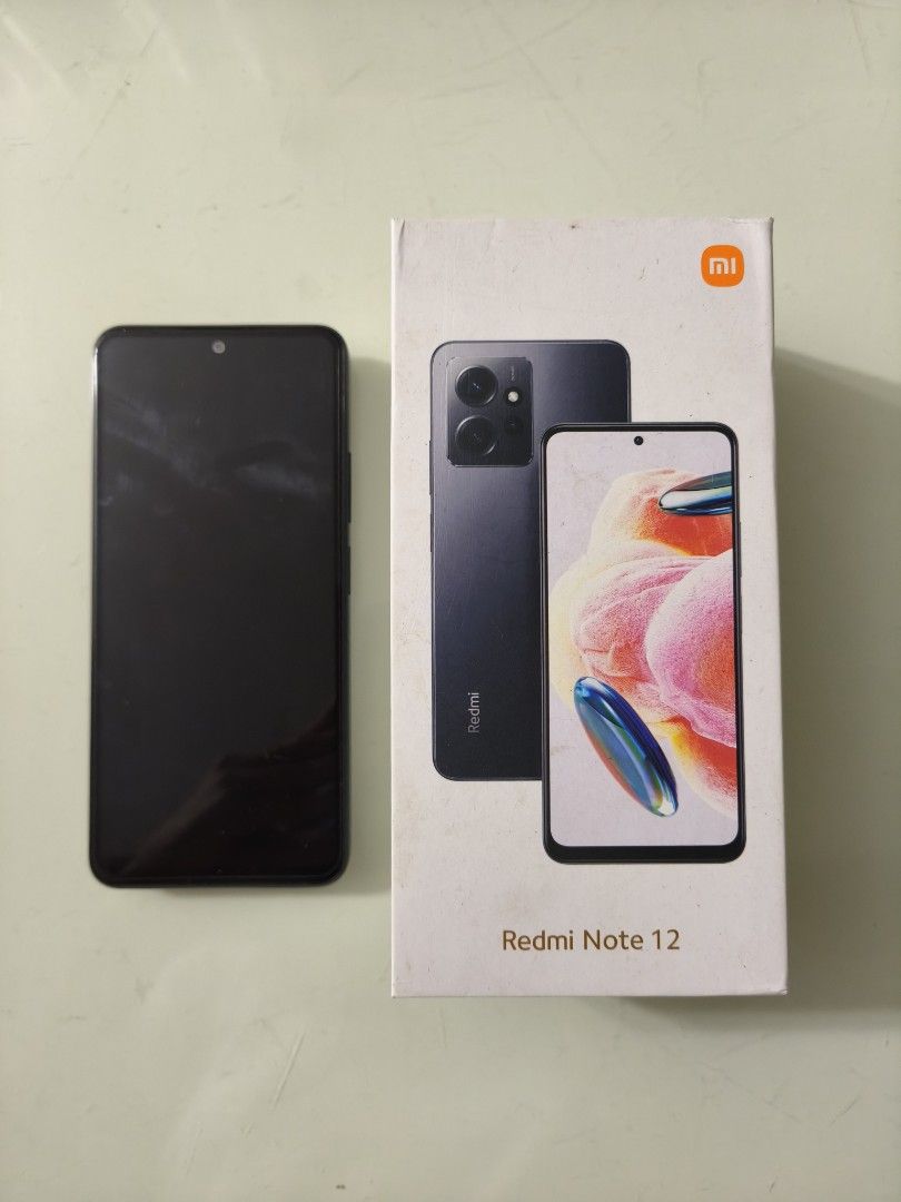 Redmi Note 12 (Category: Xiaomi) located in Marikina City. Submitted by macy_1024 (Listing ID 1462631108, Image 1). Description: Redmi Note 12 Onyx Gray lady-owned, 98% smooth with box and inclusions Negotiable :) Specs: 6GB RAM 128GB ROM Screen: 6.67-inch AMOLED DotDisplay Protection: Corning Gorilla Glass 3 Durability: IP53 dust and water resistance Battery: 5000mAh Charger: 33W Network: Dual sim (4G) + microSD card slot RFS: upgrade.