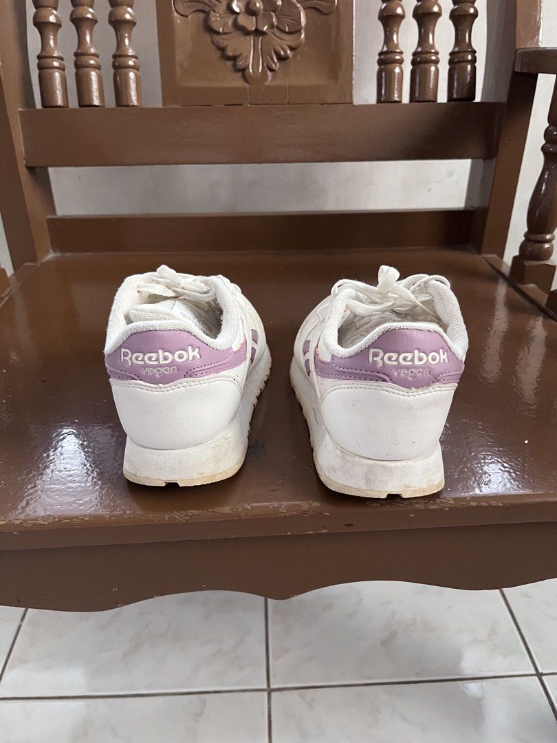 Reebok Classic Leather Sneakers White Purple (Category: Sneakers) located in Quezon City. Submitted by harold_shop (Listing ID 1462499430, Image 3). Description: - White Reebok Classic Leather sneakers - Iconic purple Reebok logo and stripes - Secure lace-up closure - Ideal for everyday casual wear.