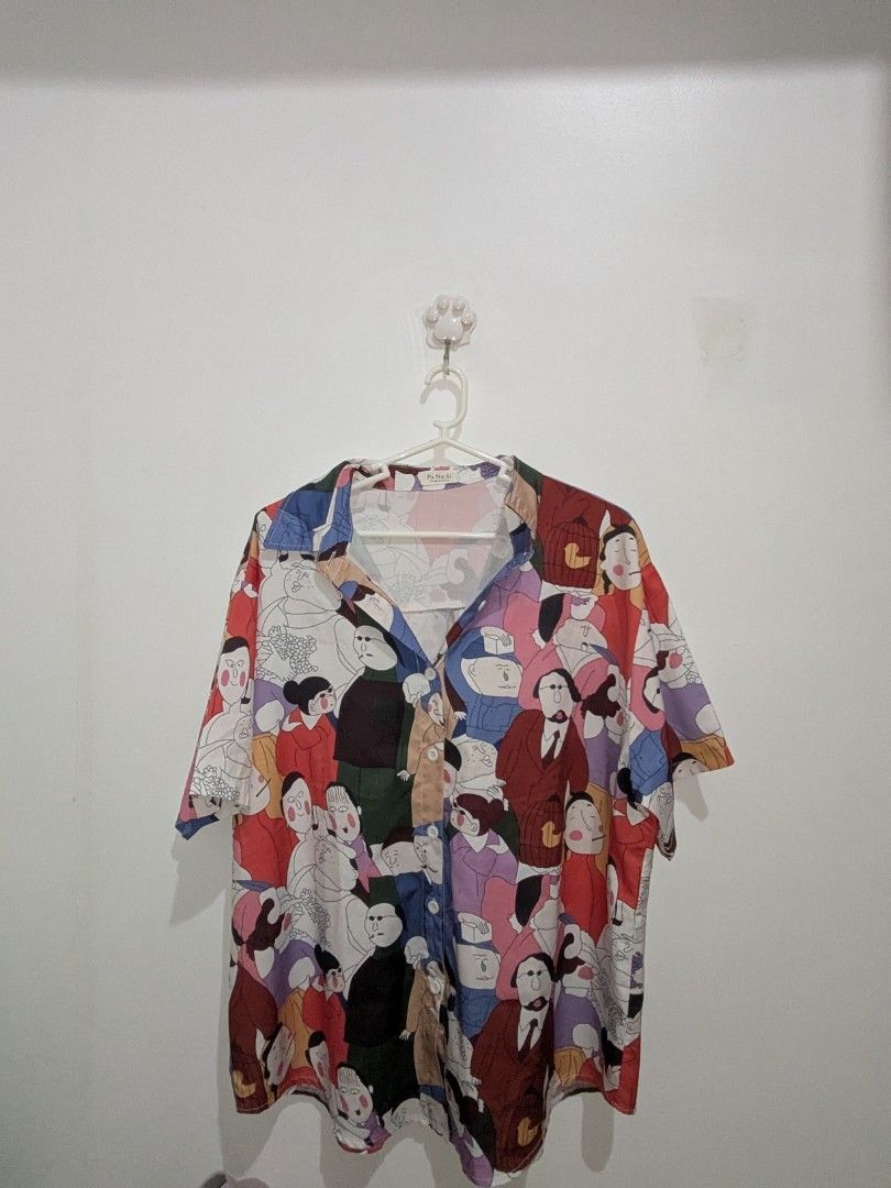 Retro style short-sleeved button-up shirt (Category: Others Tops) located in Makati City. Submitted by dunseen (Listing ID 1462606231, Image 1). Description: .