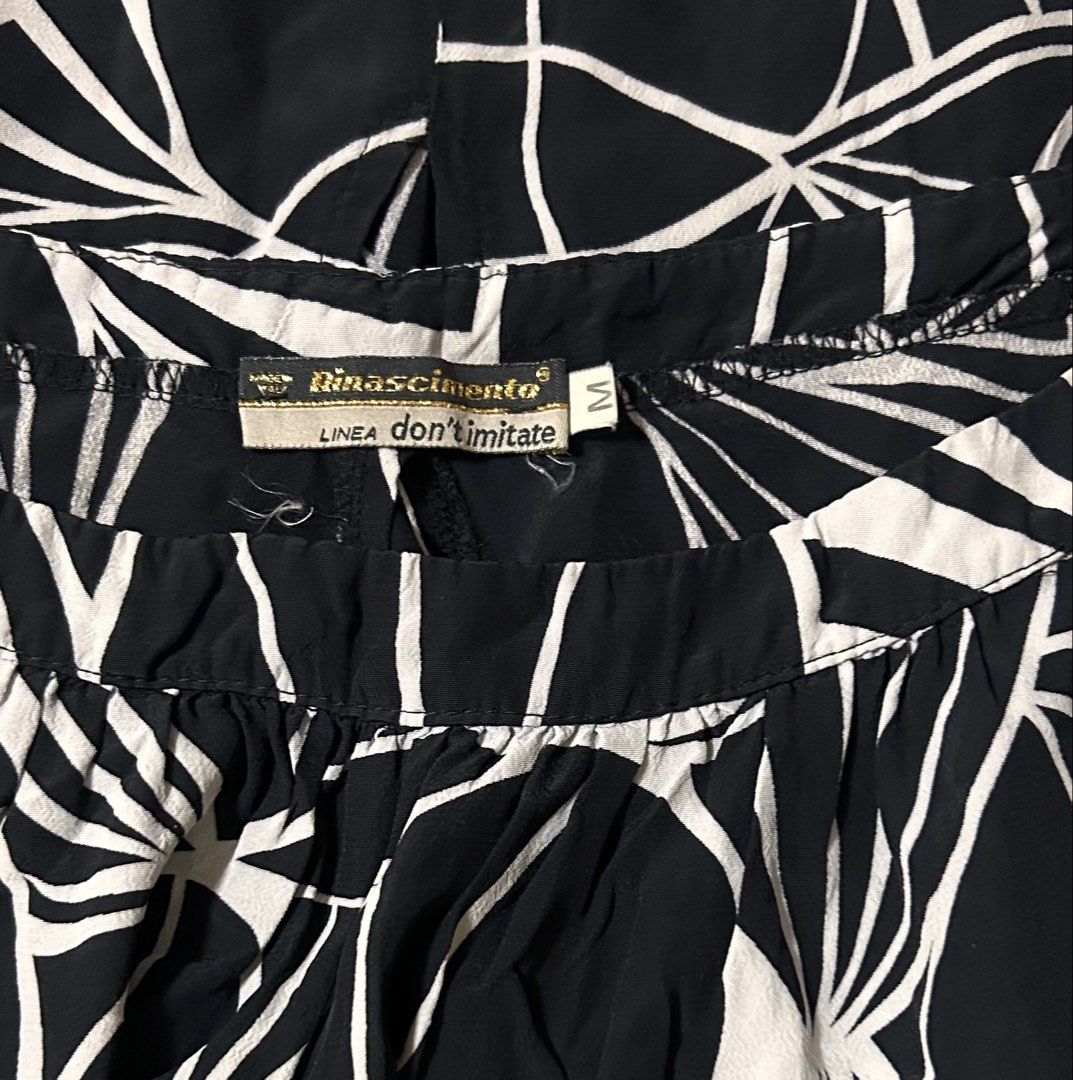 RINASCIMENTO (Category: Dresses) located in Davao. Submitted by sart0ria85 (Listing ID 1462485798, Image 3). Description: A beach dress in black and white prints of separates but as a whole dress with ribbon adjustment on side for fit or loose option. 100% POLYESTER MADE IN ITALY 🇮🇹 MEDIUM. Size 6 EXCELLENT CONDITION (92/100).