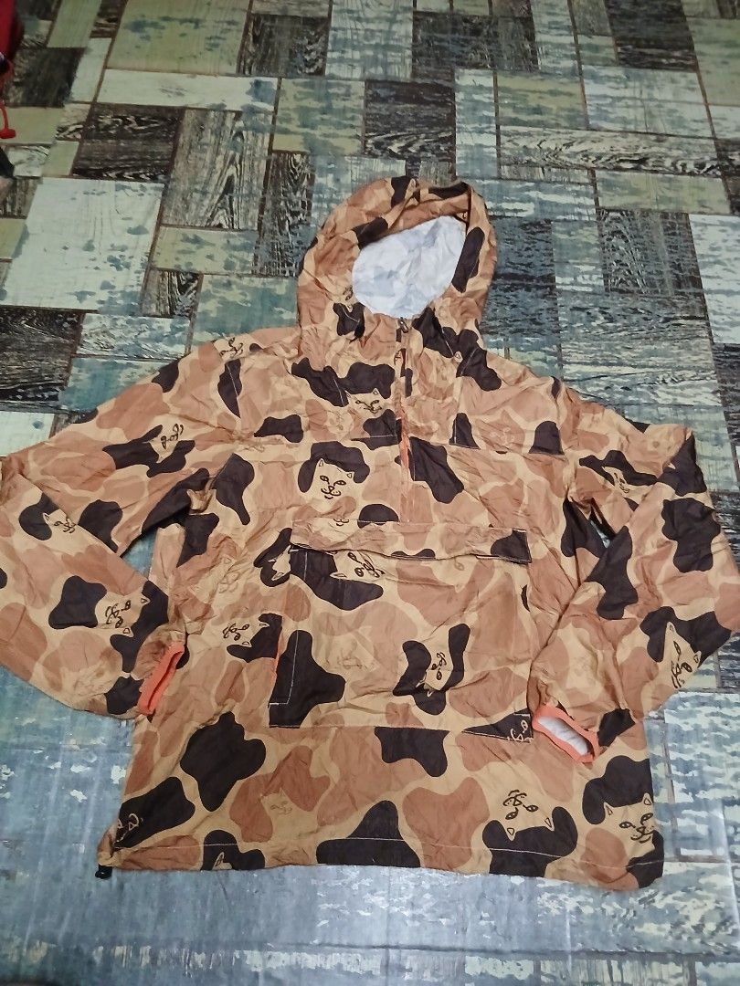 Ripndip Windbreaker Camo Jacket That Turns Into A Bag (Category: Coats, Jackets and Outerwear) located in Manila. Submitted by sendecluttersandsells (Listing ID 1462672816, Image 1). Description: Size: S Dimes: 22x26 Issue: Scratches Loc: Caloocan Ship: J&T Meetup: Monumento, SM Grand, Cloverleaf Mall (SM North, Trinoma Friday or Sunday).