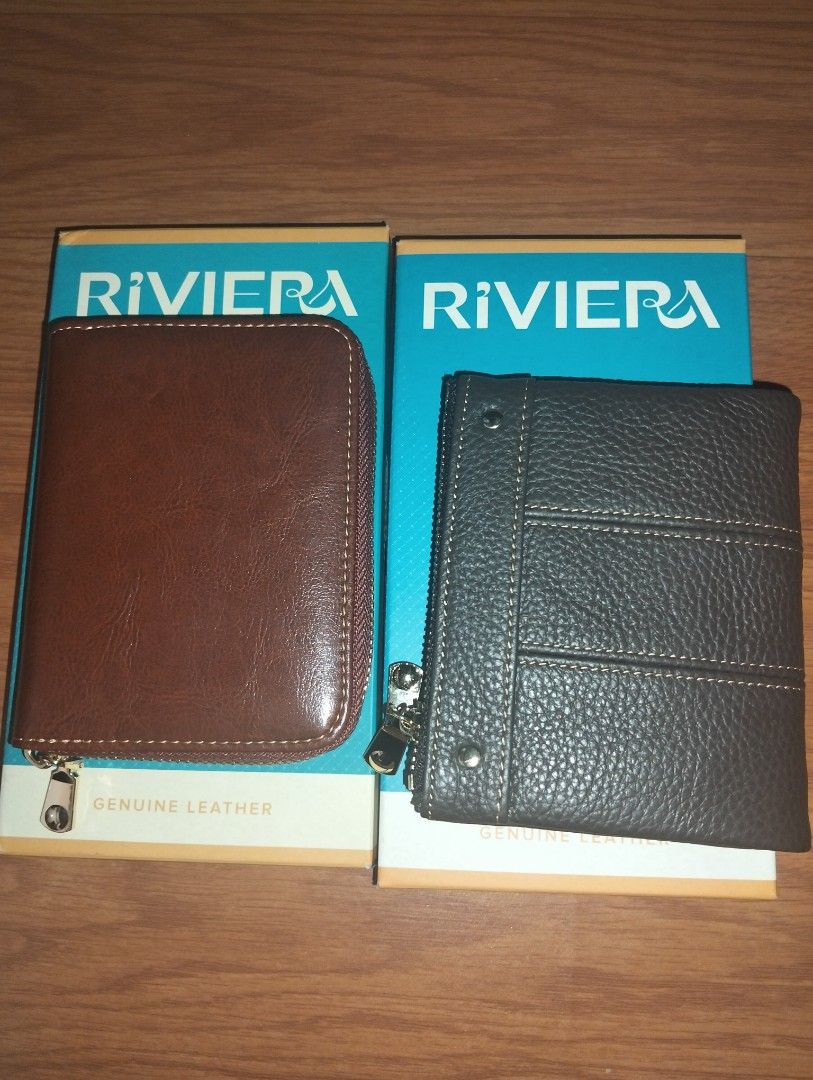 Riviera Genuine Leather Short Wallet (Category: Wallets & Card holders) located in Caloocan City. Submitted by girlshopmcollection (Listing ID 1462644484, Image 2). Description: - Two Riviera genuine leather wallets available: 1 Brown, 1 Dark - Both feature secure zippers and multiple card slots for organization. - The brown wallet includes a convenient card holder insert. - Ideal for keeping your cash and cards neatly organized. - Both wallets c