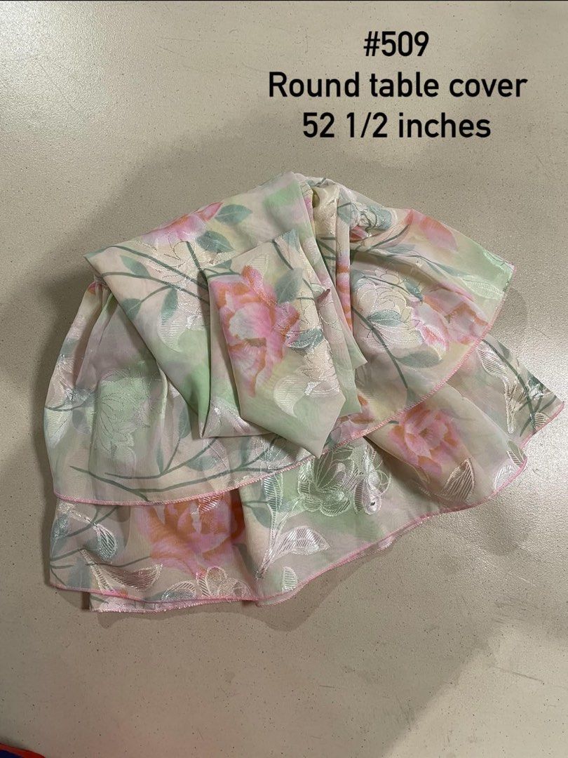 Round Table Cover 52 1/2 Inches Floral Pattern (Category: Tables & Sets) located in Quezon City. Submitted by meggoquingco (Listing ID 1462549831, Image 1). Description: - Pretty pink and green floral design - Measures 52 1/2 inches across - Features a subtle sheen - Ruffled edges for a decorative touch - Ideal for protecting your table or as a decorative accent - Fits a round table.