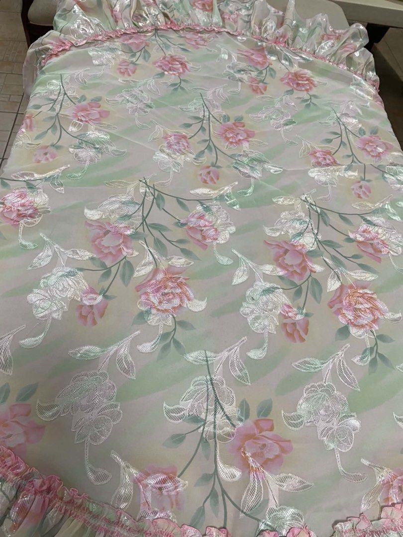 Round Table Cover 52 1/2 Inches Floral Pattern (Category: Tables & Sets) located in Quezon City. Submitted by meggoquingco (Listing ID 1462549831, Image 2). Description: - Pretty pink and green floral design - Measures 52 1/2 inches across - Features a subtle sheen - Ruffled edges for a decorative touch - Ideal for protecting your table or as a decorative accent - Fits a round table.