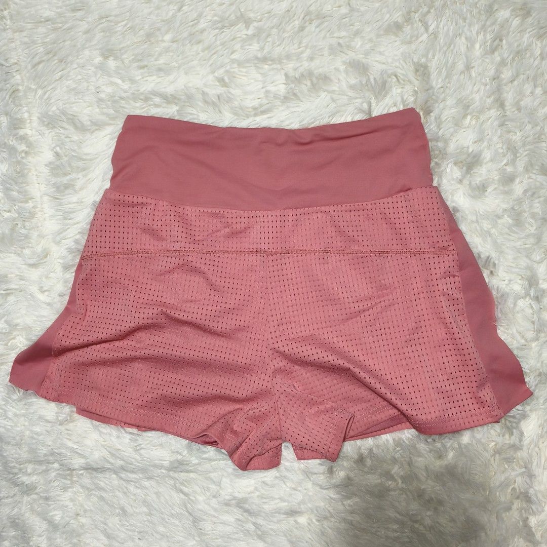 Running or Active short (Category: Activewear) located in Antipolo. Submitted by alphaomega_fox (Listing ID 1462568150, Image 2). Description: - Pink athletic shorts - High-waisted fit - Perforated design for enhanced breathability - White chevron detail on the sides - Versatile for workouts or casual wear - Comfortable and stylish 26-34x13 300 plus sf.