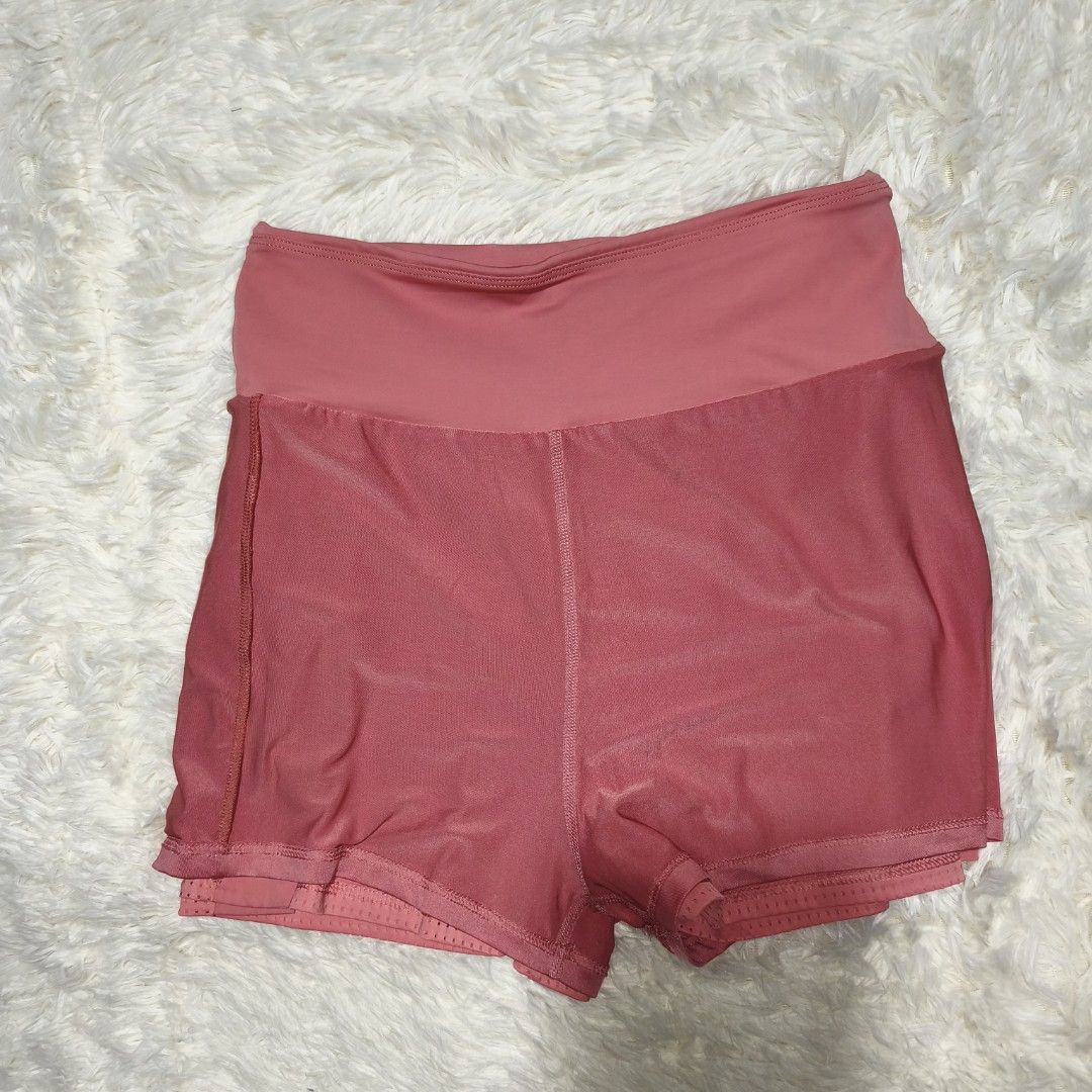 Running or Active short (Category: Activewear) located in Antipolo. Submitted by alphaomega_fox (Listing ID 1462568150, Image 3). Description: - Pink athletic shorts - High-waisted fit - Perforated design for enhanced breathability - White chevron detail on the sides - Versatile for workouts or casual wear - Comfortable and stylish 26-34x13 300 plus sf.