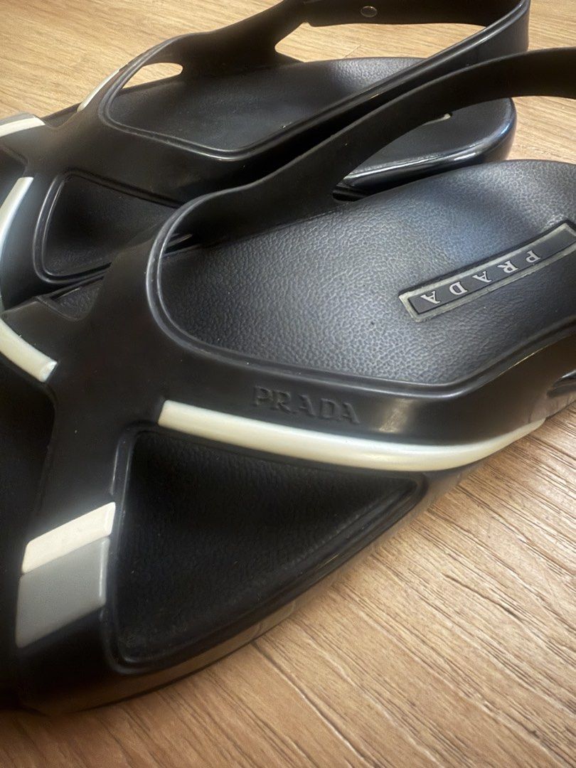 Sandals Prada (Category: Sneakers & Footwear) located in Taguig. Submitted by saritsarishop (Listing ID 1462478403, Image 3). Description: Bought in Japan 🇯🇵 Prada Sandals 👡 RAnk Good AB Unused item JUst the sandals no box, just provided dustbag as what posted in the picture. Narrow sa dulo ng paa i suggest narrow feet din To wear this correct size naman siya Need e adjust one size smaller if medyo malapad feet 👣 better not Size 8.5 US/26.5/4