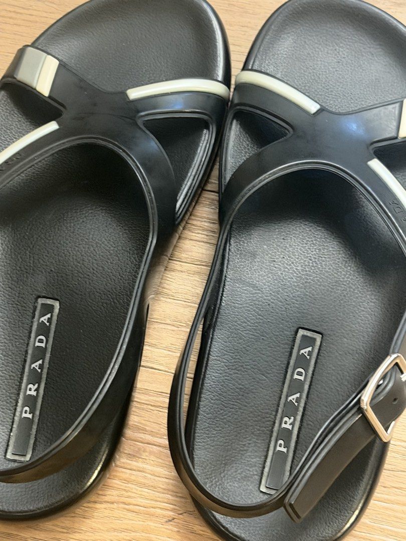 Sandals Prada (Category: Sneakers & Footwear) located in Taguig. Submitted by saritsarishop (Listing ID 1462478403, Image 2). Description: Bought in Japan 🇯🇵 Prada Sandals 👡 RAnk Good AB Unused item JUst the sandals no box, just provided dustbag as what posted in the picture. Narrow sa dulo ng paa i suggest narrow feet din To wear this correct size naman siya Need e adjust one size smaller if medyo malapad feet 👣 better not Size 8.5 US/26.5/4