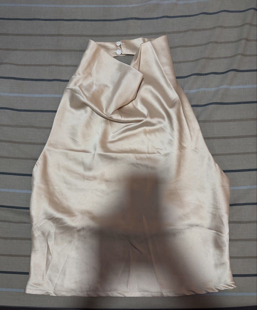 Satin Cowl Neck Top (Category: Sleeveless) located in Valenzuela. Submitted by rachmcadams (Listing ID 1462510682, Image 2). Description: • From a Vietnam brand in the 🍊app • Good as new, used once • No issues • Fits S-M • Good quality satin fabric, hindi manipis. Super nice color too! P.S. First photo is my personal when-worn RFS: Decluttering What you see is what you get! .