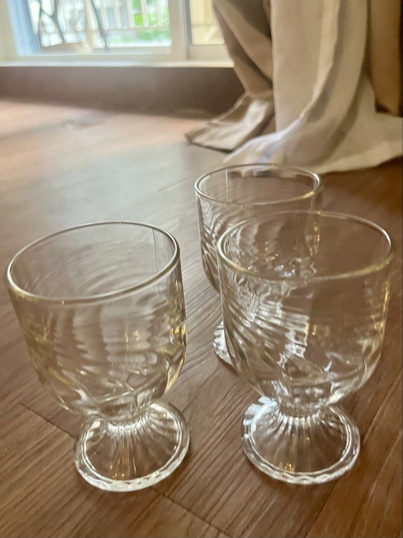 Set of 3 Clear Embossed Footed Glasses (Category: Dinnerware & Cutlery) located in Pasig City. Submitted by sgangeles (Listing ID 1462543712, Image 1). Description: - Set of 3 clear glasses - Footed base design - Textured, embossed pattern on bowl - Ideal for serving beverages or as decorative accents - Adds vintage charm to any table setting.
