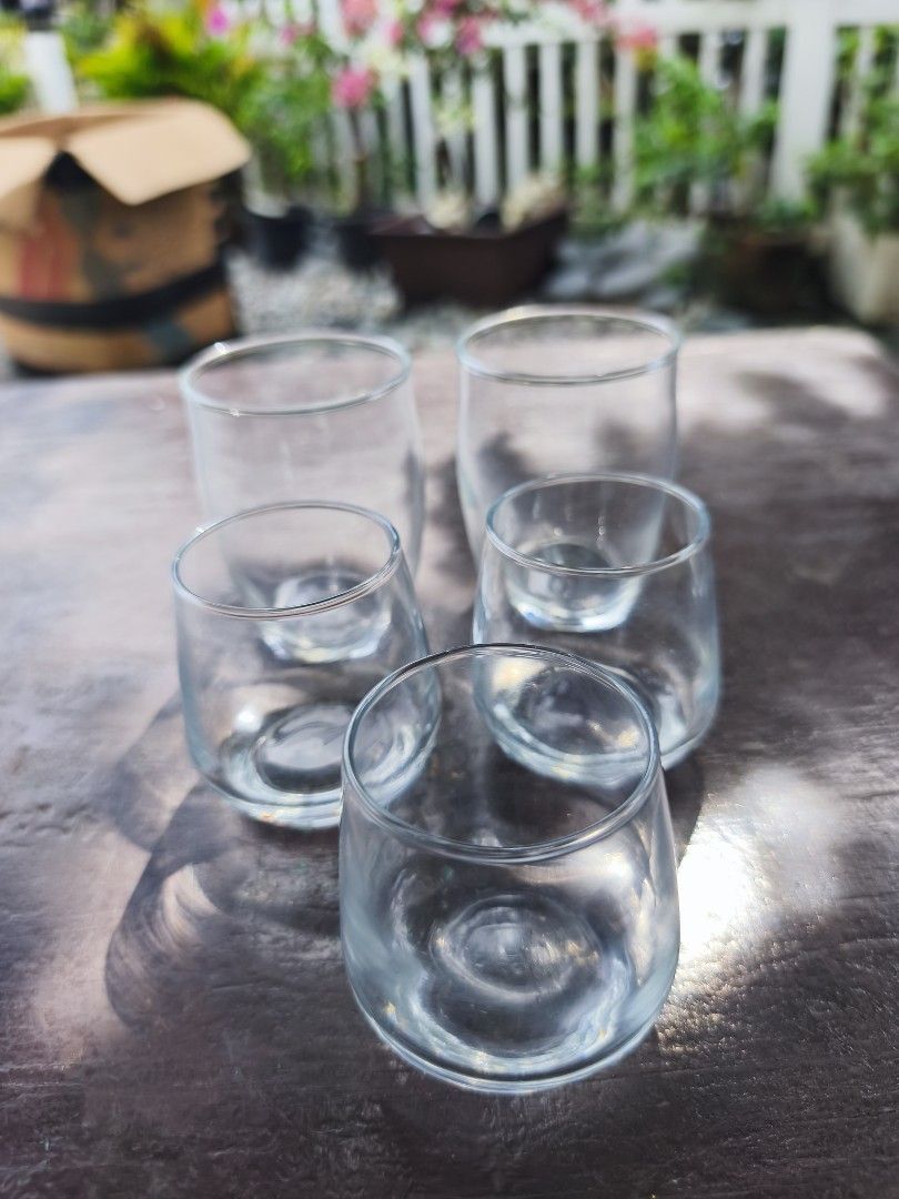 Set of 5 Clear Stemless Wine Glasses (Category: Other Kitchenware & Tableware) located in Manila. Submitted by mrs.jane08 (Listing ID 1462498110, Image 2). Description: - Set of 5 clear stemless wine glasses - Versatile: Ideal for water, juice, or wine - Simple and classic design - Made of clear glass - Perfect for everyday use or entertaining guests - Feel free to ask any questions!.