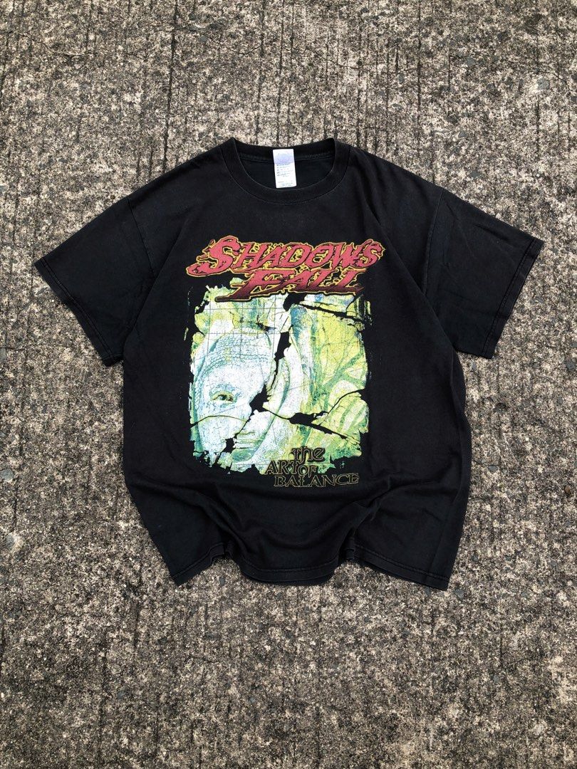 shadow fall (Category: Tshirts & Polo Shirts ) located in Manila. Submitted by thrift_neo (Listing ID 1462612546, Image 1). Description: Shadows Fall “The Art of Balance” vintage heavy metal Band from 2002 Delta pro weight tag size L on tag dimes 22x28.5 issue: uneven fading,nail holes,minimal sun fade on neck.
