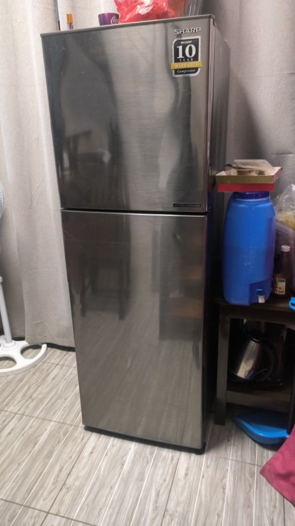 Sharp Refrigerator (Category: Refrigerators and Freezers) located in Pasig City. Submitted by silverbear.b6ddb2 (Listing ID 1462602093, Image 2). Description: - Sharp 2-door refrigerator with top freezer - FOR SALE — ₱5,000 ONLY 📌 As Is, Where Is Previously damaged due to flooding and was repaired, with some parts replaced. ✅ Still makes cold water and ice Selling it as is, where is. Please manage expectations and inspect the item before purchas