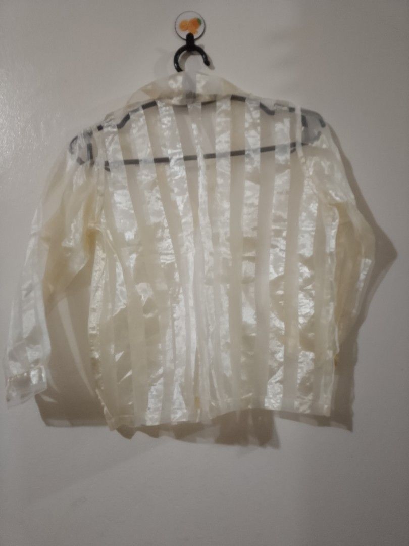 Sheer Striped Long Sleeve Blouse Top (Category: Babies & Kids Fashion) located in Cavite. Submitted by rodrycuteshop (Listing ID 1462642827, Image 2). Description: - Sheer white blouse - Vertical stripe pattern - Long sleeves with elastic cuffs - Button-up front closure - Lightweight and airy fabric - Ideal for layering over camisoles or bralettes - Adds an elegant touch to any outfit.