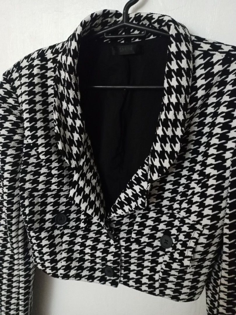 SHEIN Houndstooth Cropped Blazer and Skirt Set (Category: Sets or Coordinates) located in Marikina City. Submitted by airapreloved091826 (Listing ID 1462467847, Image 3). Description: - Cute houndstooth set from SHEIN - Includes cropped double-breasted blazer - Includes flared mini skirt - Classic black and white houndstooth pattern - Perfect for a chic, put-together look - Versatile: wear pieces together or separately.