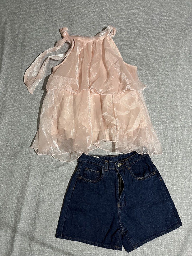 SHEIN Pink Organza Ruffle Top (Category: Sets or Coordinates) located in Manila. Submitted by az0r_ (Listing ID 1462504829, Image 1). Description: - Adorable pink organza top with charming ruffles and adjustable tie straps. - Top is from SHEIN, size Small (S). - Comes with a pair of stylish dark wash denim shorts. - Shorts are also size Small (S). - Ideal outfit for a casual day out or a fun beach trip. - Perfect summer combo for a trendy look..