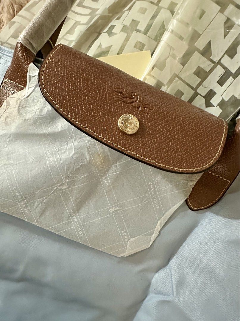 Shoulder Bag Light Blue (Category: Tote Bags) located in Rizal. Submitted by stuffbuyph (Listing ID 1462475466, Image 3). Description: - light blue tote bag - Classic leather trim and handles - Secure zipper closure - Comes with original packaging - Ideal for everyday use - Folds easily for convenient storage.