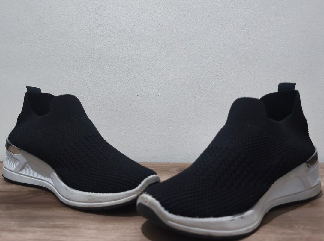 Shubizz Black Wedge Shoes (38) (Category: Sneakers) located in Amadeo. Submitted by money.can.buy.happiness (Listing ID 1462618208, Image 2). Description: Mall Price: 1,299 Selling Price: 600 - Authentic - Size: US 38 - Color: Black - Heel Height: Approx. 2 inches Issues: - Some stains on the wedge parts - Some black markings on the metal parts Note: Also selling white version of this pair for the same price. Meet up at Skymart Manggahan.
