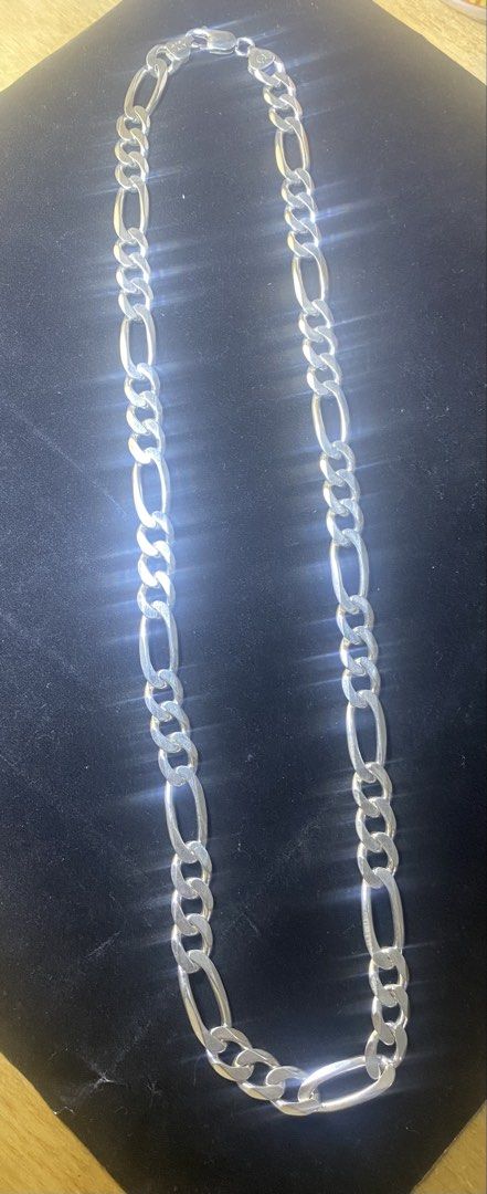 Silver Figaro Chain Necklace (Category: Jewelry) located in Manila. Submitted by timeisgoldyoyongpinoy (Listing ID 1462487024, Image 1). Description: FOR SALE!🙂 925 ITALY Silver Necklace -65.2 grms X 200 per gram -lenght: 24 inches - Classic silver Figaro chain - Substantial look with well-defined, shiny links - Secure clasp for peace of mind - Versatile: great for layering or wearing alone - A timeless and elegant accessory ₱rice: 13,040 ~Cash 
