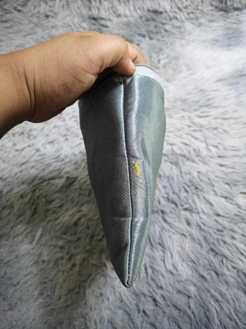 Silver Grey Zipper Closure Cosmetic Pouch (Category: Stationery & School Supplies) located in Santa Cruz. Submitted by jmy_surplus.2 (Listing ID 1462673024, Image 3). Description: Size ; L - 7.6 W - 9.2 Color ; Silver grey Type ; Pouch Brand ; No brand Material ; Nylon Style ; Silver Grey Cosmetic Pouch LR 129 JMY 1 Batch #221.