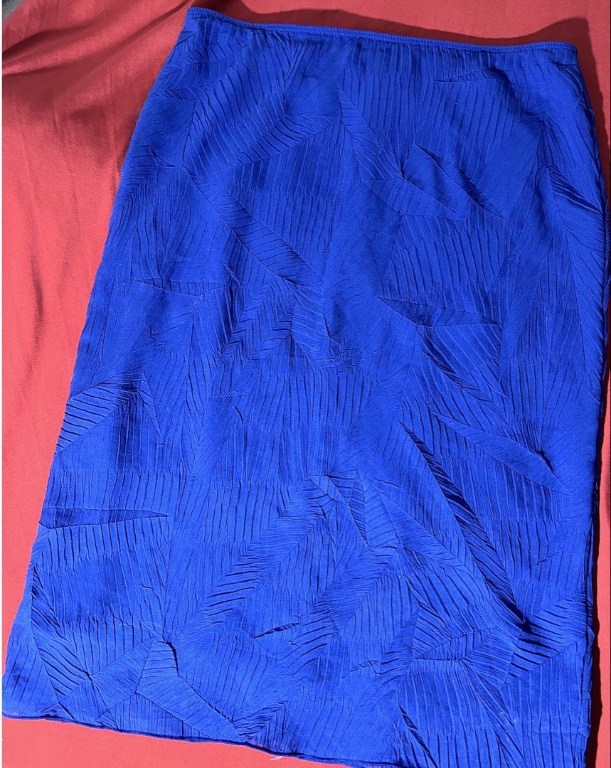 Sisley Blue Textured Skirt - Small to Medium (Category: Skirts) located in Las Pinas. Submitted by everythingandanything00 (Listing ID 1462522101, Image 1). Description: - Blue midi skirt from Sisley - Textured leaf pattern all over - Comfortable elasticated waistband - Perfect for dressing up or down - Style with a cute top for a chic look - Outfit inspiration photos provided.