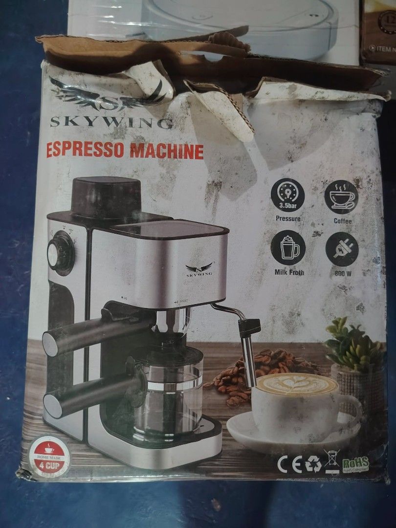 Skywing Espresso Machine 4 Cup 800W (Category: Coffee Machines & Makers) located in Olongapo. Submitted by zenbear.389c0d (Listing ID 1462641842, Image 1). Description: - Skywing Espresso Machine - Makes 4 cups - 3.5 bar pressure - Capable of making coffee and milk froth - 800W power - Ideal for home use - Machine is new, box has some wear.