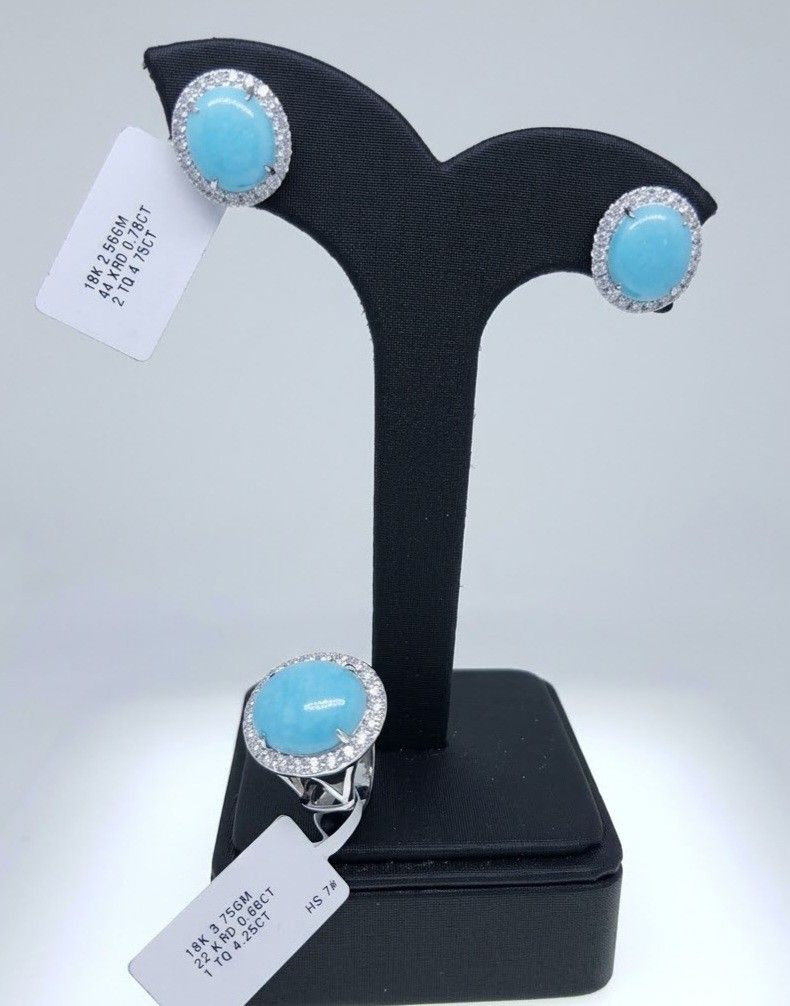 Sleeping Beauty Turquoise (Category: Earrings) located in Marikina City. Submitted by dgoldhub (Listing ID 1462622743, Image 1). Description: - Exquisite 18K white gold set - Features beautiful oval turquoise stones - Accented with sparkling diamonds - Ring: 3.75GM, 0.66CT total diamond weight - Earrings: 2.56GM, 0.78CT total diamond weight - Total diamond weight for the set: 1.44CT - A truly eye-catching and elegant piece.