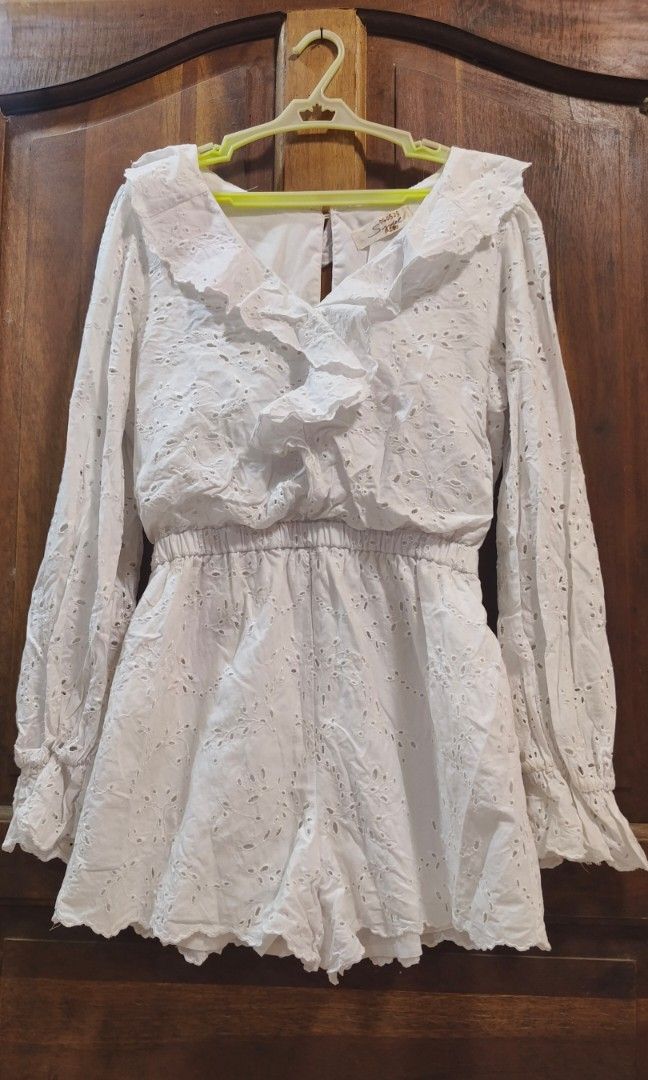 Snidel White Eyelet Ruffle Long sleeve Romper (Category: Rompers) located in Cainta. Submitted by shaye_declutters (Listing ID 1462502577, Image 1). Description: used once fabric is flowy and breathable with markings on tag since this was thrifted slightly stretchy l: 28.5" b: ‎32-34" w: ‎24-28".
