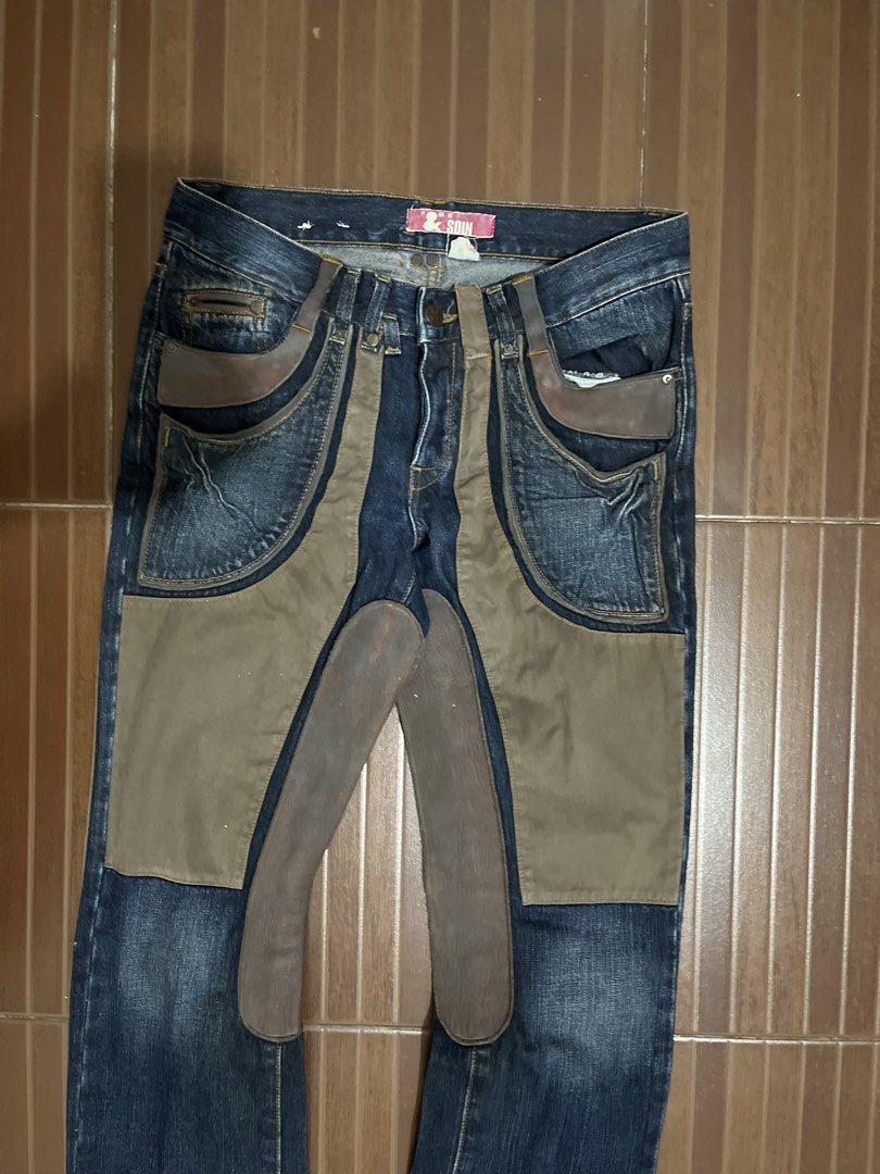 SOIN H.M. Fit Jeans Size 29 (Category: Jeans) located in Manila. Submitted by cypher05 (Listing ID 1462615482, Image 2). Description: - Brand: SOIN, H.M. Fit - Style: Dark wash denim jeans - Fit: Relaxed - Size: 29 - Unique Details: Tan patchwork on front and back - Perfect for: Creating a distinctive, statement look.