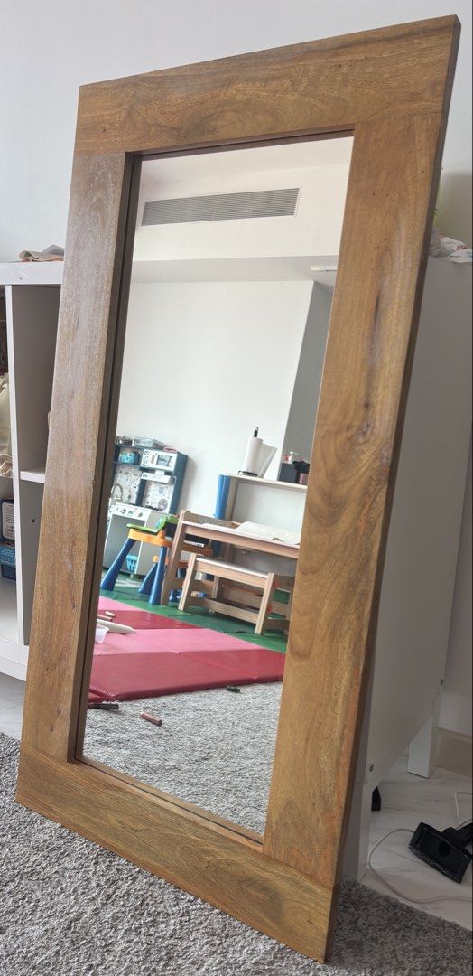 Solid Oak Framed Mirror (Category: Mirrors) located in Singapore. Submitted by warmtree_6253c2 (Listing ID 1462490300, Image 3). Description: - Large rectangular mirror 120 x 60 cm - Solid oak frame with natural grain and warm tone - Suitable for hallway, bedroom, or living area - Can be hung vertically or horizontally - Ready for a new home.