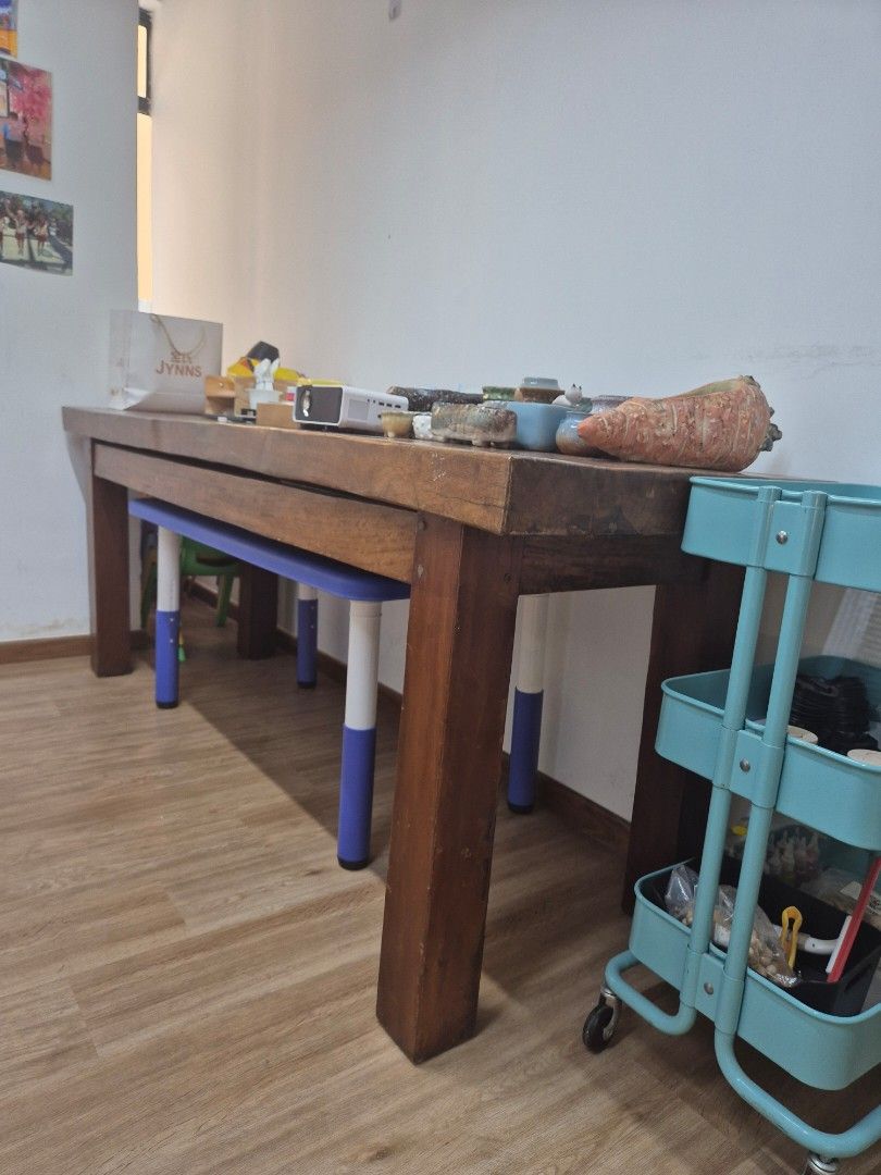 Solid Timber Table (Category: Tables & Sets) located in Singapore. Submitted by kimhoecorporationleasing (Listing ID 1462528145, Image 2). Description: - Solid Timber Table - Well used - 205cm long x 65cm wide x 80cm high.