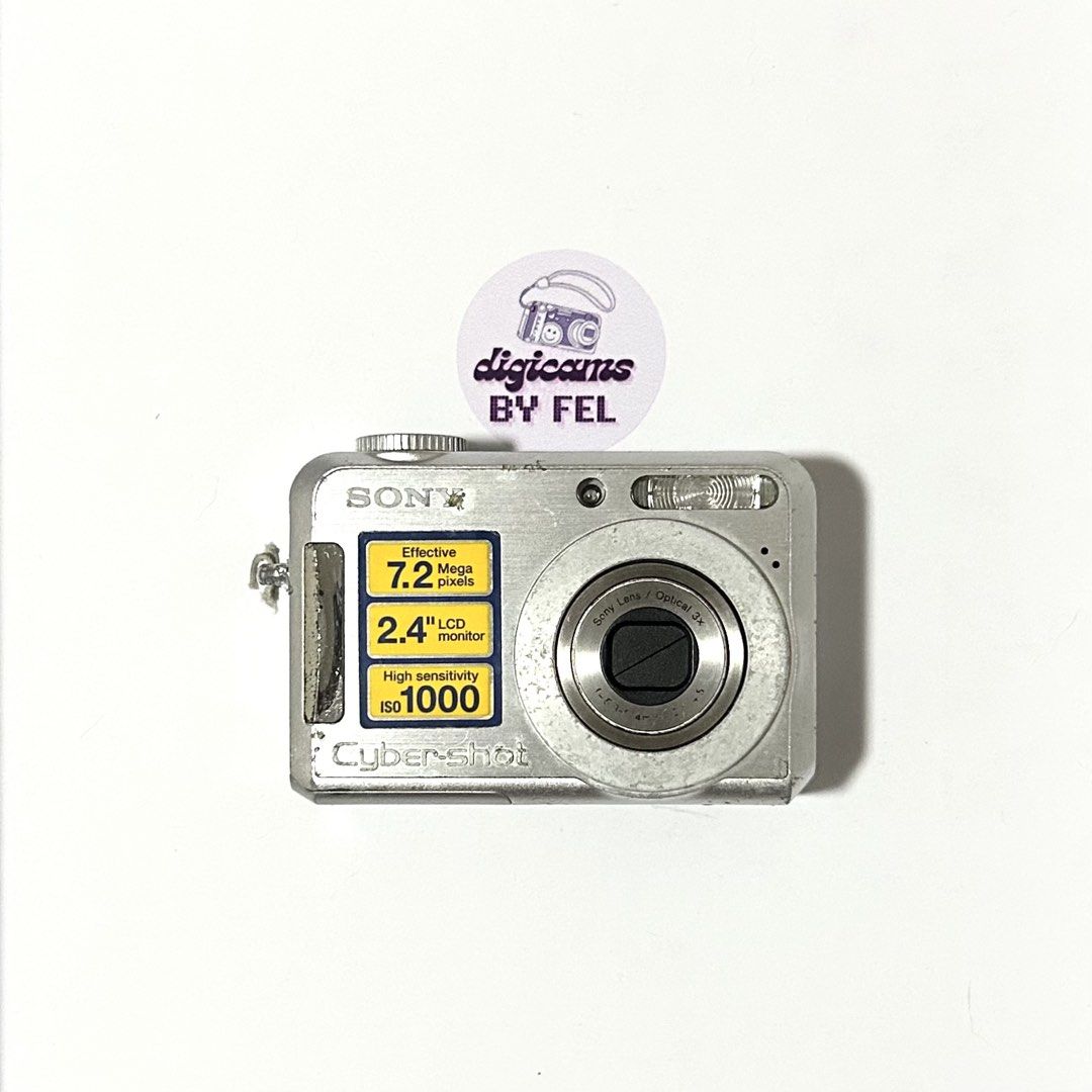 Sony Cyber-shot DSC-S700 (Category: Cameras) located in Manila. Submitted by digicams.byfel (Listing ID 1462648057, Image 1). Description: • ₊˚. 🏷️ Sony Cyber-shot DSC-S700 silver 🪞 𐙚 7.2mp 𐙚 3x optical zoom 𐙚 2.4” LCD screen (clean & clear display) 𐙚 uses 2x AA batteries 𐙚 body condition: 6.5/10 (visible scratches, paint fading & wear on edges/bottom) 𐙚 clean photo output 𐙚 flash, zoom, and all buttons are working ⋆｡˚ honest flaw: heavy