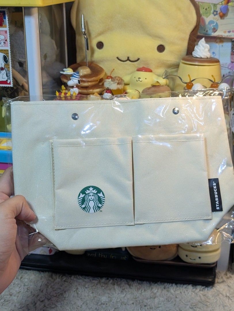 Starbucks Canvas Handbag (Category: Purses & Pouches) located in San Pedro. Submitted by eurisilvers (Listing ID 1462590491, Image 1). Description: — shipping is via J&T Express — mop: gcash, maya, bank transfer — location: san pedro city, laguna.