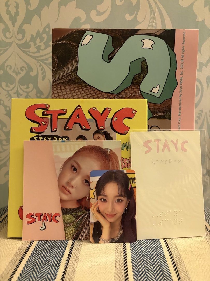 STAYC STAYDOM Album (Category: CDs & DVDs) located in Manila. Submitted by sc.moo04 (Listing ID 1462650262, Image 1). Description: - complete inclusions - sold as set.