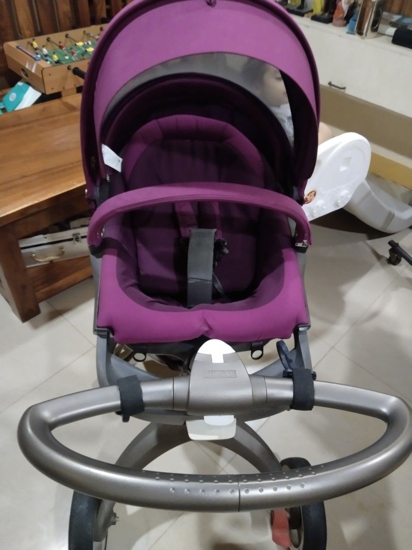 Stokke Stroller - Purple (Category: Strollers) located in Cavite. Submitted by dimple082 (Listing ID 1462499097, Image 3). Description: stokke - Stokke stroller in a lovely purple color. - Comfortable seat for your little one's enjoyment. - Large canopy provides excellent sun protection. - Sturdy wheels ensure smooth and stable rides. - Convenient storage basket underneath for essentials. - Ideal for easy travel and daily outings. - Well-maintain