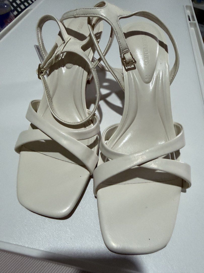 Stradivarius White Strappy Block Heels Size 36 (Category: Heels) located in Cebu City. Submitted by adrieyen (Listing ID 1462556197, Image 2). Description: - Brand: Stradivarius - Color: White - Style: Block Heels - Features: Strappy design, ankle strap, square toe - Size: 36 - Condition: Brand new with original tag attached - Reason for Selling: Wrong Size - Usage: Never worn.