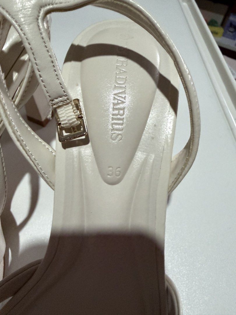 Stradivarius White Strappy Block Heels Size 36 (Category: Heels) located in Cebu City. Submitted by adrieyen (Listing ID 1462556197, Image 3). Description: - Brand: Stradivarius - Color: White - Style: Block Heels - Features: Strappy design, ankle strap, square toe - Size: 36 - Condition: Brand new with original tag attached - Reason for Selling: Wrong Size - Usage: Never worn.
