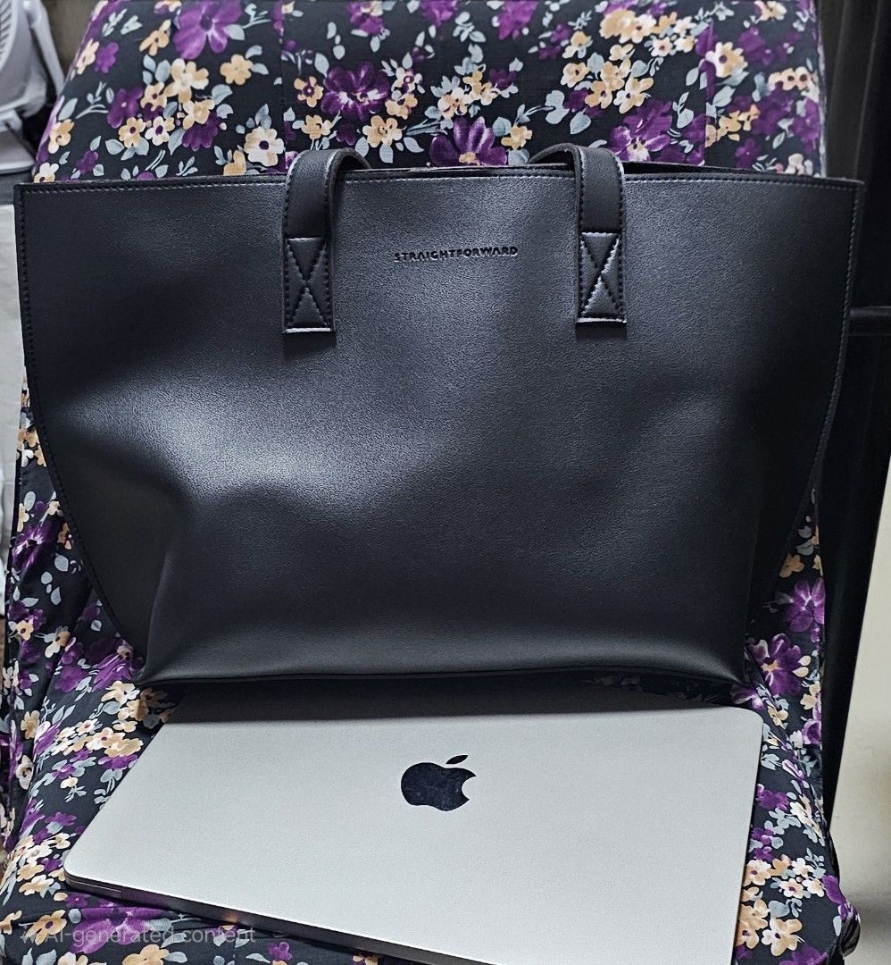Straightforward Black Tote Bag (Category: Tote Bags) located in Marikina City. Submitted by anbierose (Listing ID 1462588654, Image 1). Description: - Classic black tote bag from Straightforward. - Spacious interior, fits a laptop (MacBook shown). - Simple and chic design. - Ideal for work or everyday use. - Features sturdy handles. - Minimalist style..