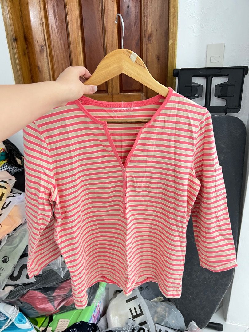Striped 3/4 Sleeve Top (Category: Blouses) located in Baguio. Submitted by pureearth.5f1c08 (Listing ID 1462552281, Image 1). Description: - Pink and beige striped pattern - 3/4 sleeves - V-neckline with a small slit - Comfortable and casual design - Ideal for everyday wear - Easily pairs with jeans or shorts.