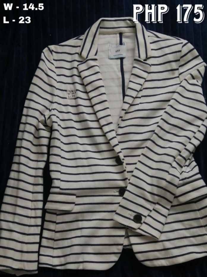 Striped Blazer (Category: Coats, Jackets and Outerwear) located in Batangas. Submitted by zenshark-e5f6 (Listing ID 1462445938, Image 1). Description: - Classic white and navy striped blazer - Features a two-button closure - Functional pockets included - Versatile for casual or semi-formal outfits - Measurements: Width - 14.5 inches, Length - 23 inches.