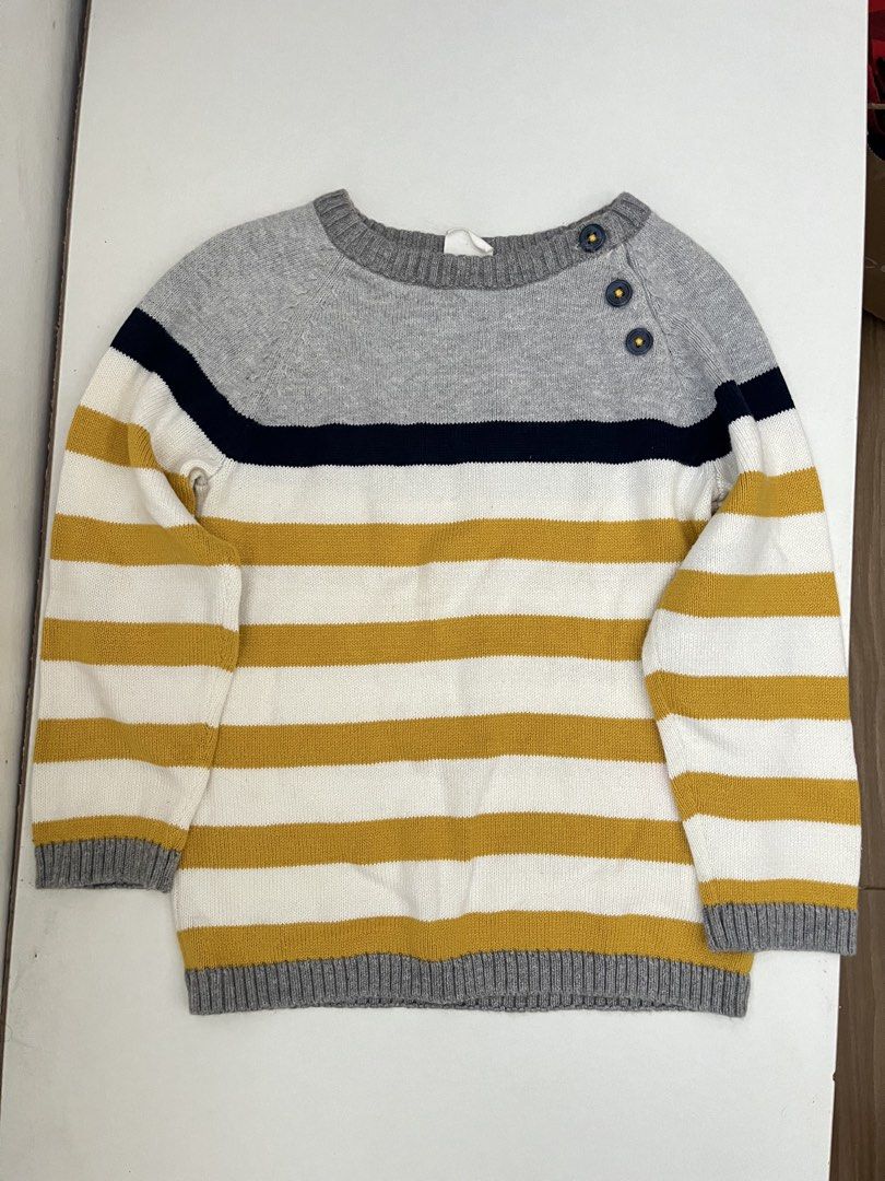 Striped Sweater with Button Detail (Category: Longsleeves) located in Las Pinas. Submitted by chelcie.sindhy (Listing ID 1462456568, Image 1). Description: - Classic striped sweater in grey, navy, white, and mustard yellow. - Stylish raglan sleeves with button detail on the shoulder. - Comfortable ribbed cuffs and hem. - Versatile piece for layering or standalone wear..