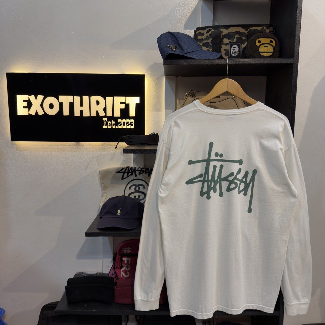 Stussy Basic Logo White Sweatshirt (Green Print) (Category: Coats, Jackets and Outerwear) located in Manila. Submitted by jerichomal82553 (Listing ID 1462563300, Image 1). Description: Stussy Basic Logo White Sweatshirt (Green Print) 22.5 by 31.5 Good Condition Complain Tags CLAIM 2K.