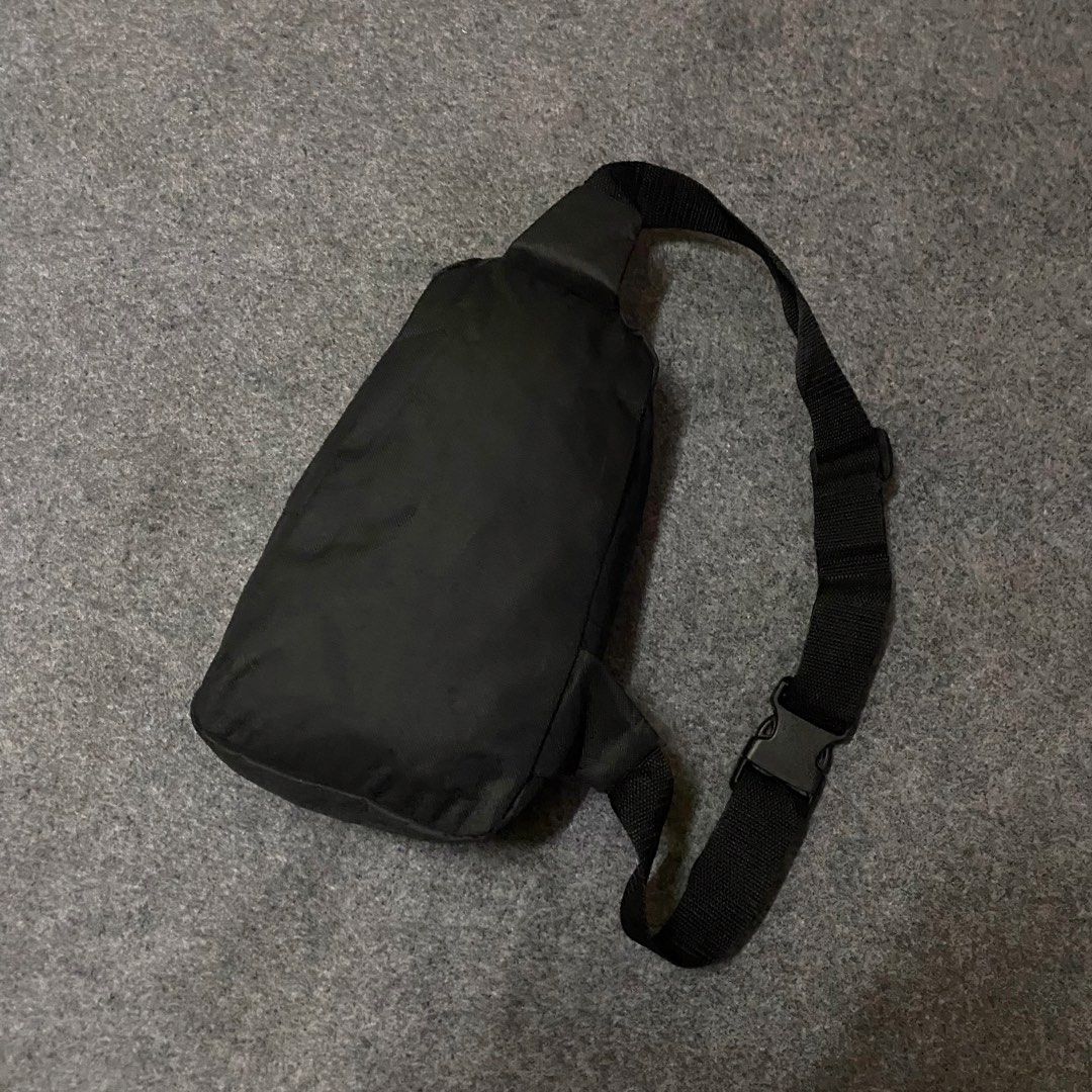 Stussy Black Sling Bag with American Flag Patch (Category: Sling Bags) located in Cebu City. Submitted by callmejasonx (Listing ID 1462564628, Image 2). Description: - Black Stussy sling bag - Features Stussy logo on the front - 'Stussy Troops' American flag patch - Main compartment with two internal pockets - Adjustable strap for comfortable wear - Ideal for everyday use -Authentic Magazine Bag.