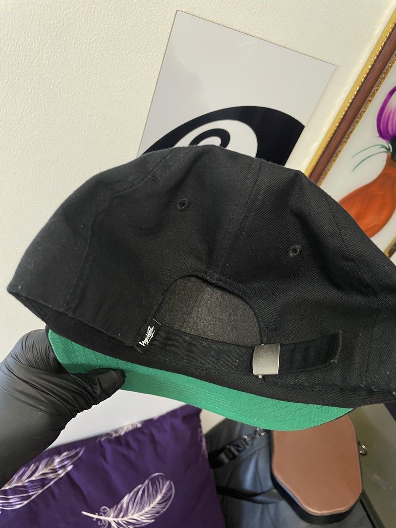 Stussy Black STU Cap OSFA (Category: Caps & Hats) located in Manila. Submitted by cis_thrift143 (Listing ID 1462533881, Image 3). Description: - Brand: Stussy - Color: Black - Embroidery: White 'STU' logo - Size: One Size Fits All (OSFA) - Material: 100% Cotton - Origin: Made in Bangladesh - Underbrim: Green - Features: Adjustable strap at the back - Vibe: Good vibes!.