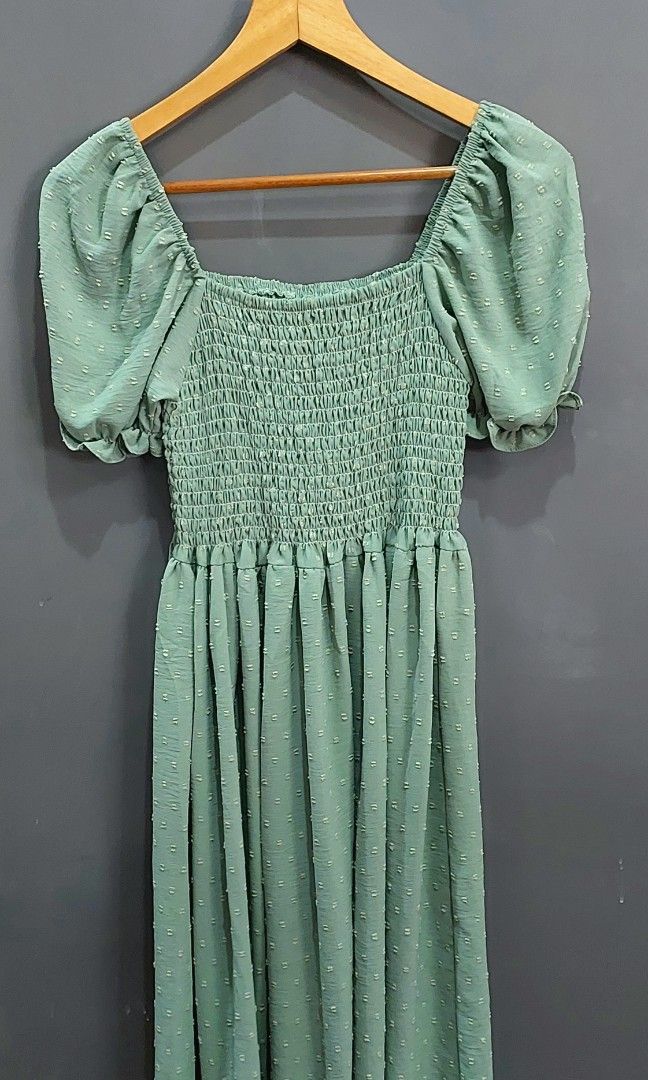 Summer dresses bundle of 3 (Category: Dresses) located in Las Pinas. Submitted by thechaptermarketph (Listing ID 1462504148, Image 2). Description: Pretty and feminine sage and light green maxi dresses featuring a delicate eyelet/embroidered fabric with tiny textured details. Designed with a smocked bodice, adjustable front tie, and cute puff sleeves with tie cuffs for a romantic, cottagecore-inspired look. ✨ Details: Sage green | light green Smo