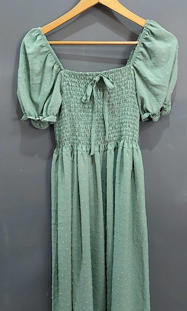Summer dresses bundle of 3 (Category: Dresses) located in Las Pinas. Submitted by thechaptermarketph (Listing ID 1462504148, Image 1). Description: Pretty and feminine sage and light green maxi dresses featuring a delicate eyelet/embroidered fabric with tiny textured details. Designed with a smocked bodice, adjustable front tie, and cute puff sleeves with tie cuffs for a romantic, cottagecore-inspired look. ✨ Details: Sage green | light green Smo