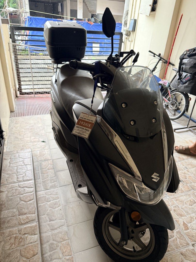 Suzuki Burgman 125 Scooter (Category: Motorbikes for Sale) located in Taguig. Submitted by barorep (Listing ID 1462450050, Image 2). Description: Burgman Street EX 125 2024 mileage 5k only with original GIVI box (no key) westlake tire 120/70-12 FRONT 130/70-12 REAR ♦️Price still negotiable for sure buyer♦️ - Registered until 2026 - stock pipe & grab bar still with me - with minor scratch sa left side bumagsak sa parking pero walang basag - no acc
